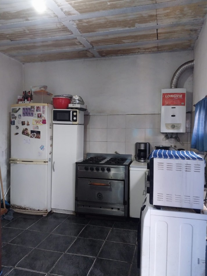 Casa 2 dormitorios con cochera para 2 vehiculos , posibilidad de ampliacion / a terminar - se acepta permuta propiedad zona sur. Parque Habitacional Ibarlucea