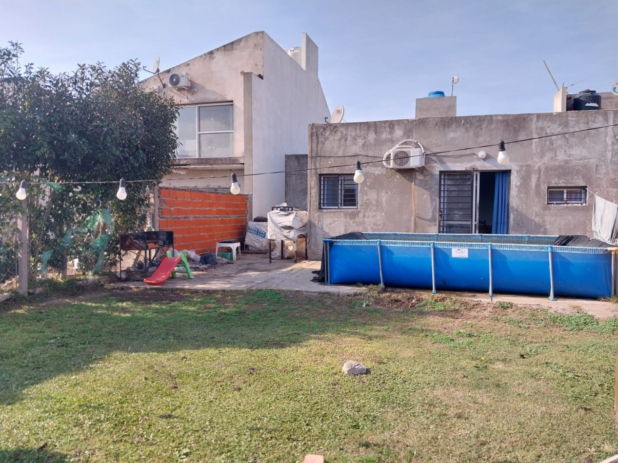 Casa 2 dormitorios con cochera para 2 vehiculos , posibilidad de ampliacion / a terminar - se acepta permuta propiedad zona sur. Parque Habitacional Ibarlucea