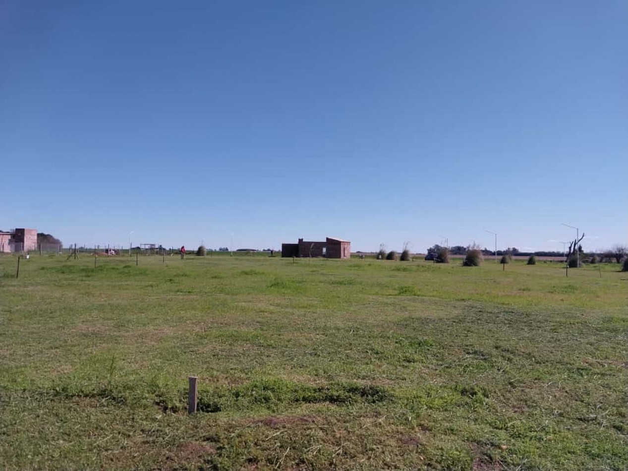 Terrenos de 300 m2 a 500 m2 con una entrega , cuotas fijas  amplia financiacion  en pesos - se Acepta vehiculo en parte de pago